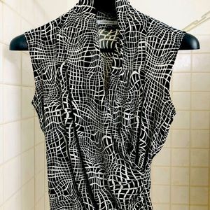 Sleeveless wrap around impression.